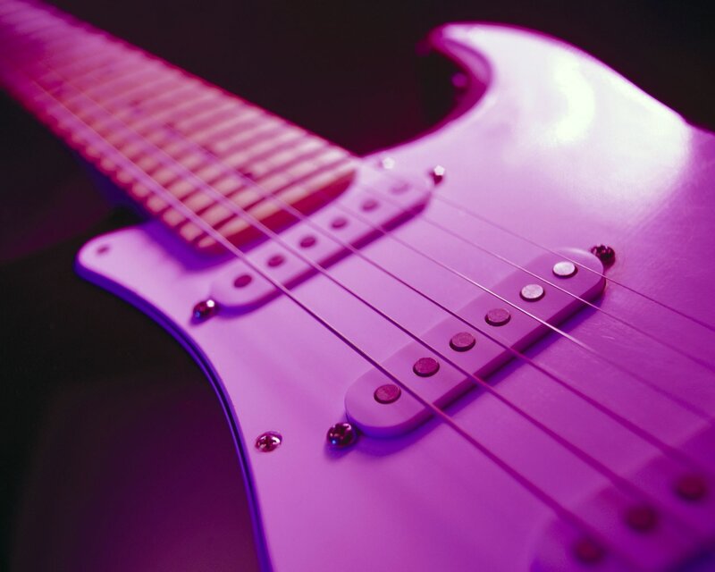 Purple electric guitar close-up
