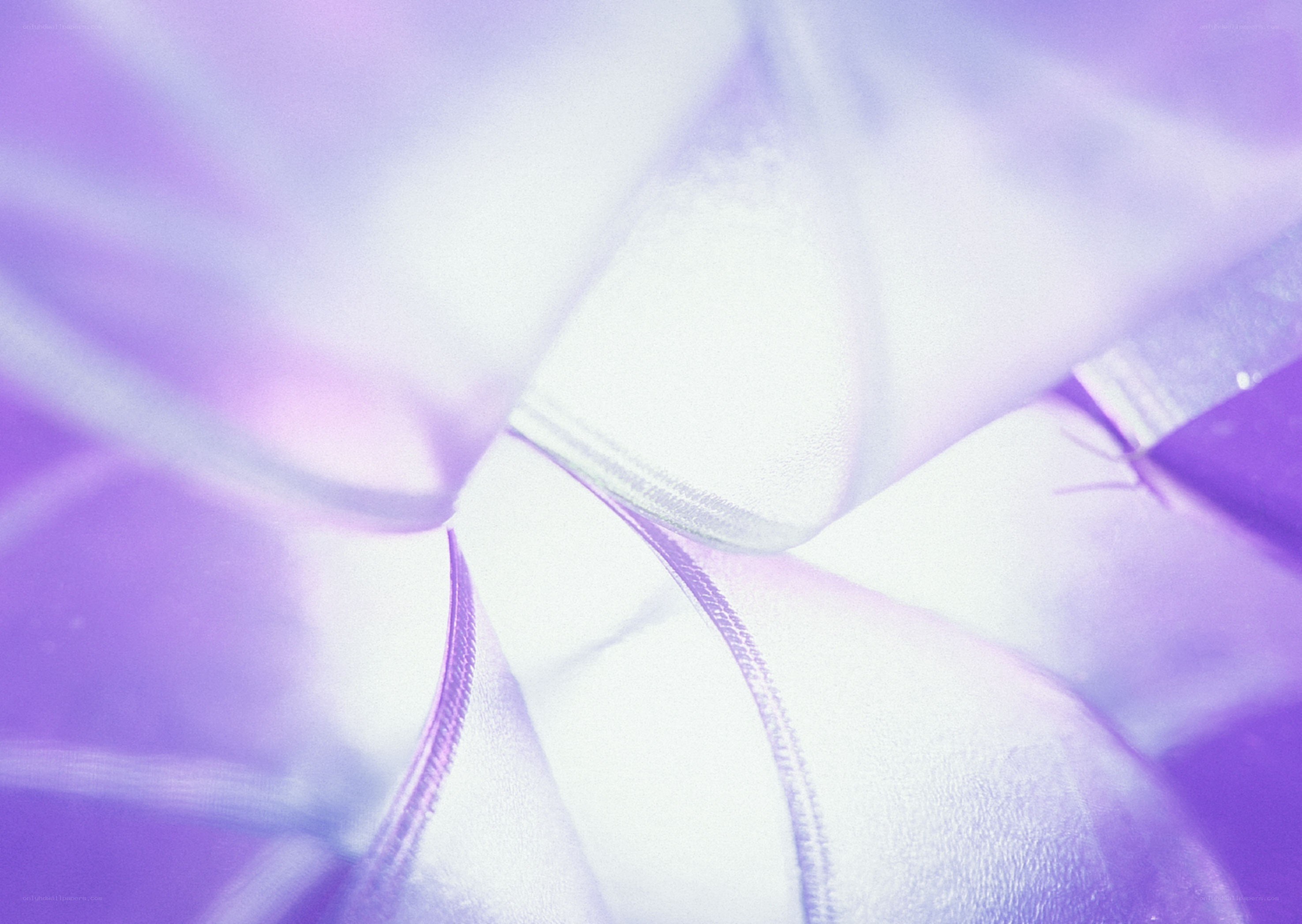 purple fabric folds