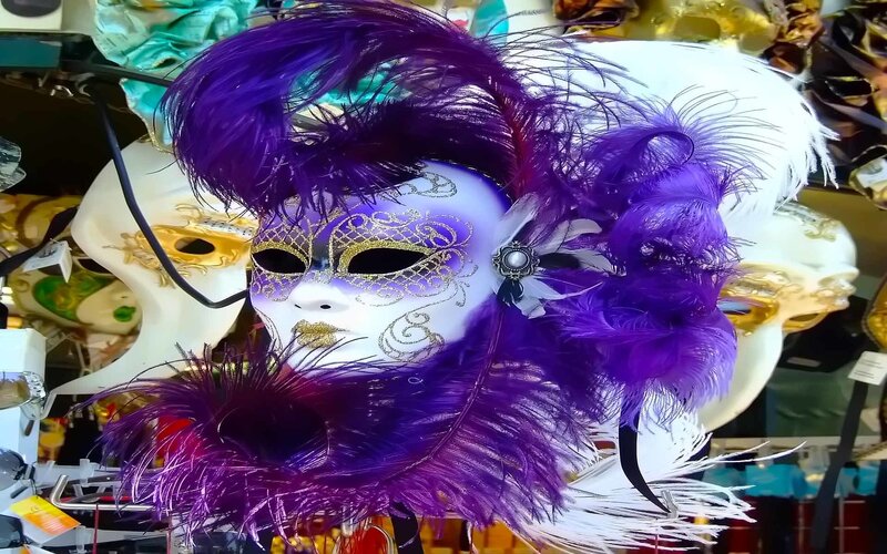 purple feathered masquerade mask
