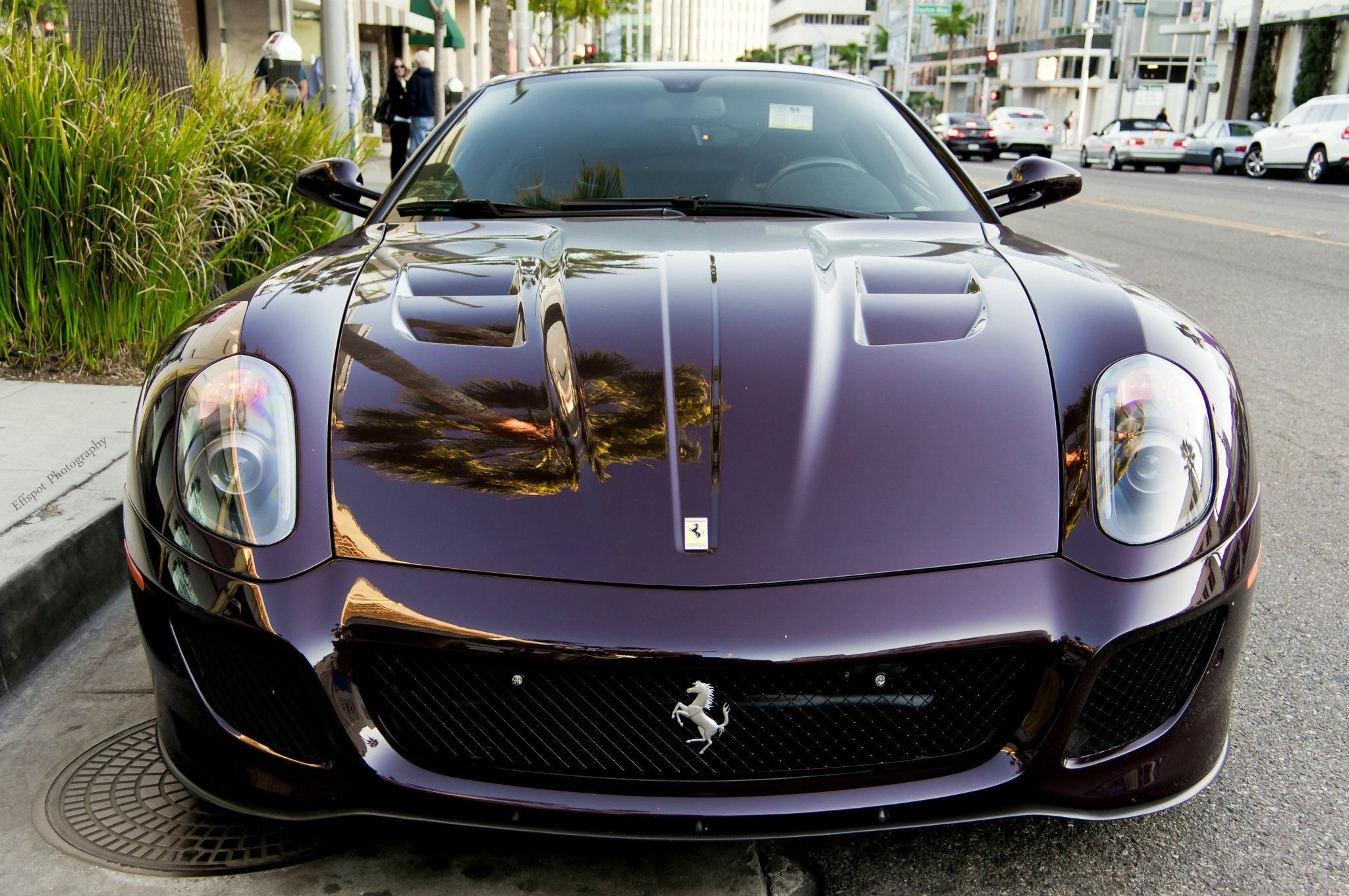 Purple Ferrari parked on street