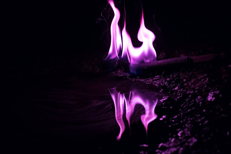 Purple Flames on Water