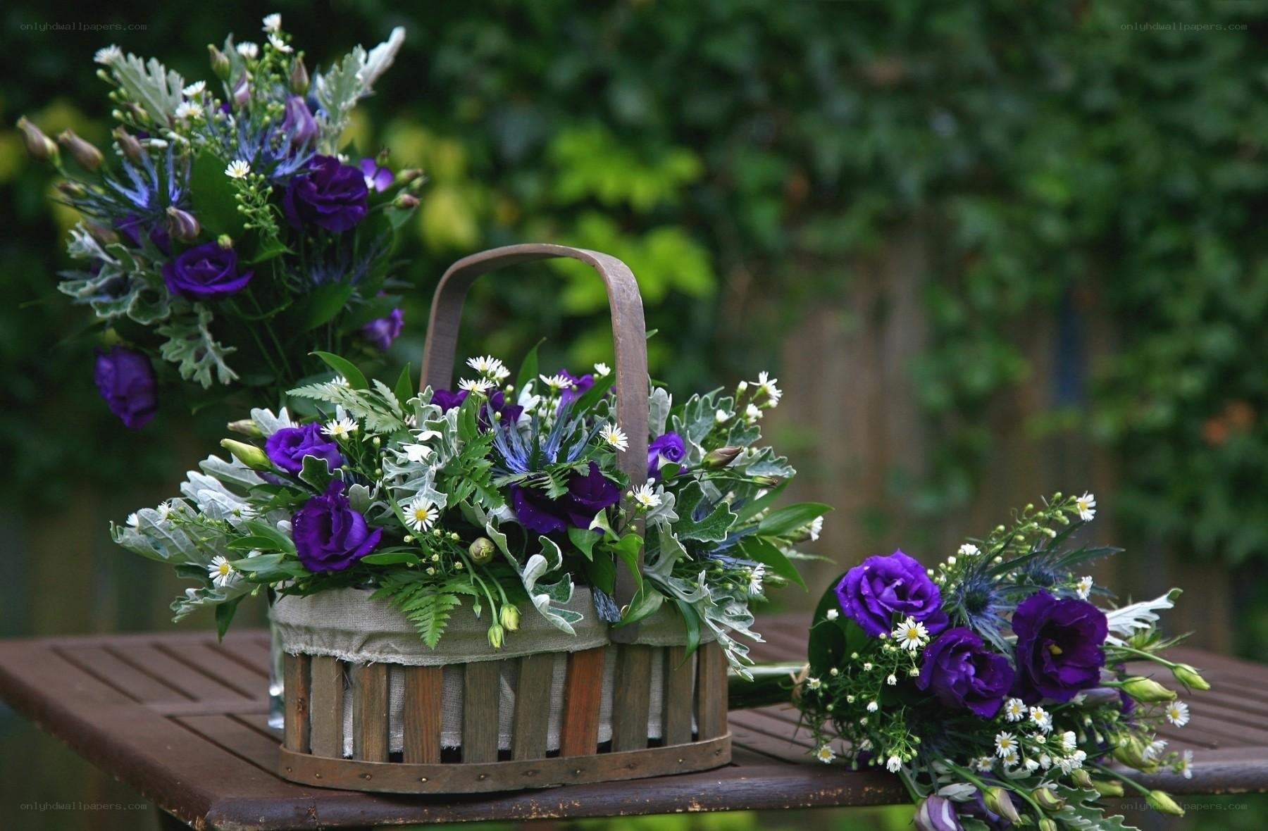 Purple flower arrangements in baskets