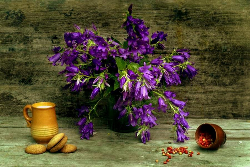 Purple flowers and rustic still life