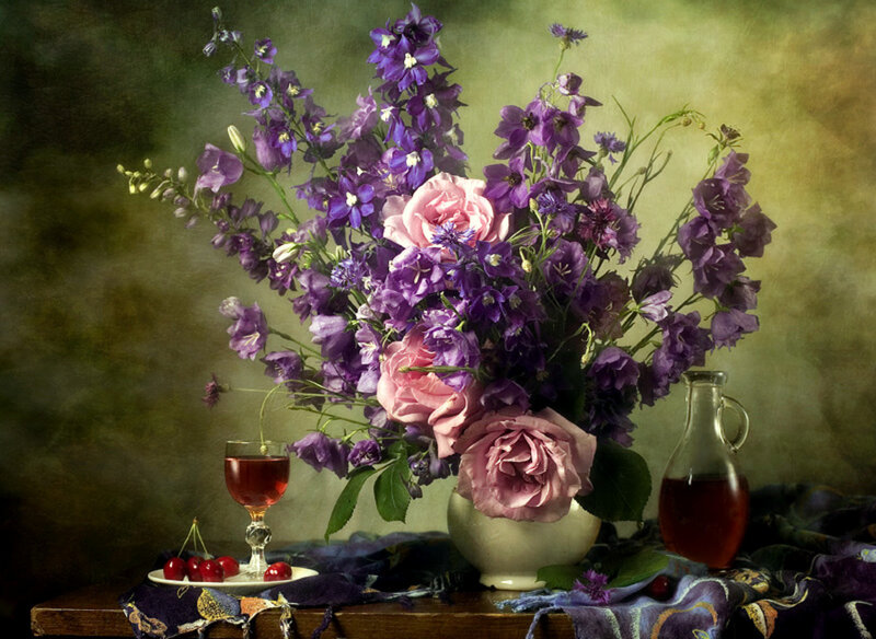 Purple flowers and wine still life