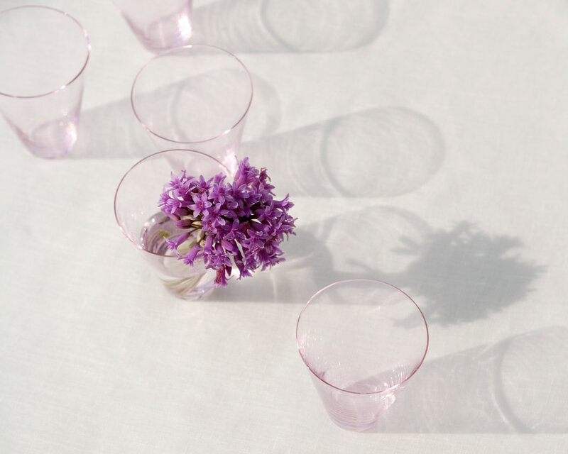 Purple Flowers in Glass — White