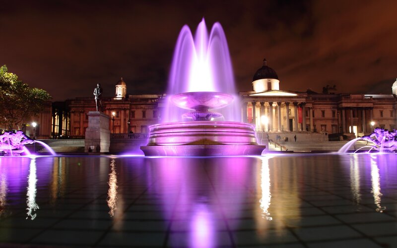 Purple fountain at night in London