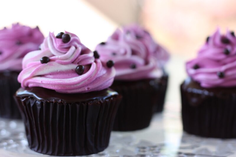 Purple-frosted chocolate cupcakes