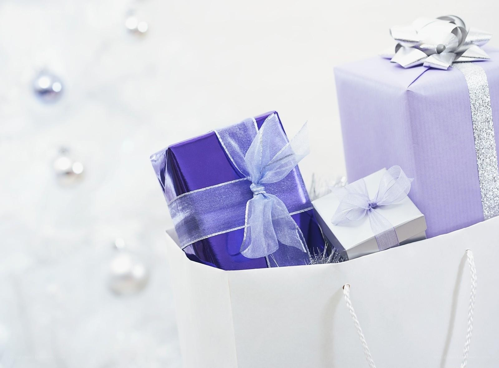 Purple gift boxes in a bag