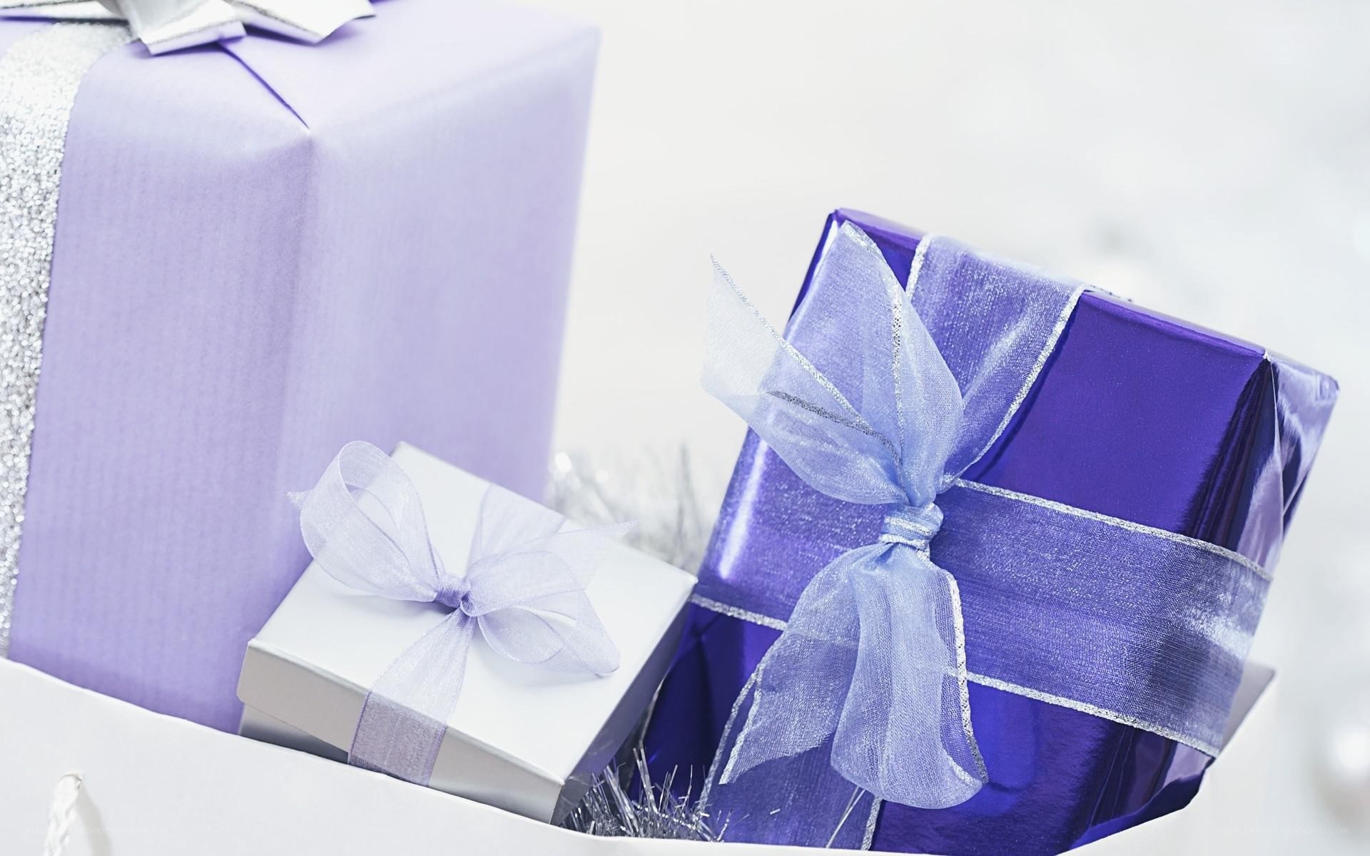 Purple gift boxes with ribbons
