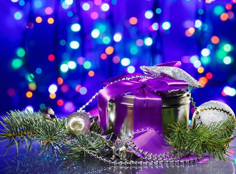 Purple gift with holiday lights