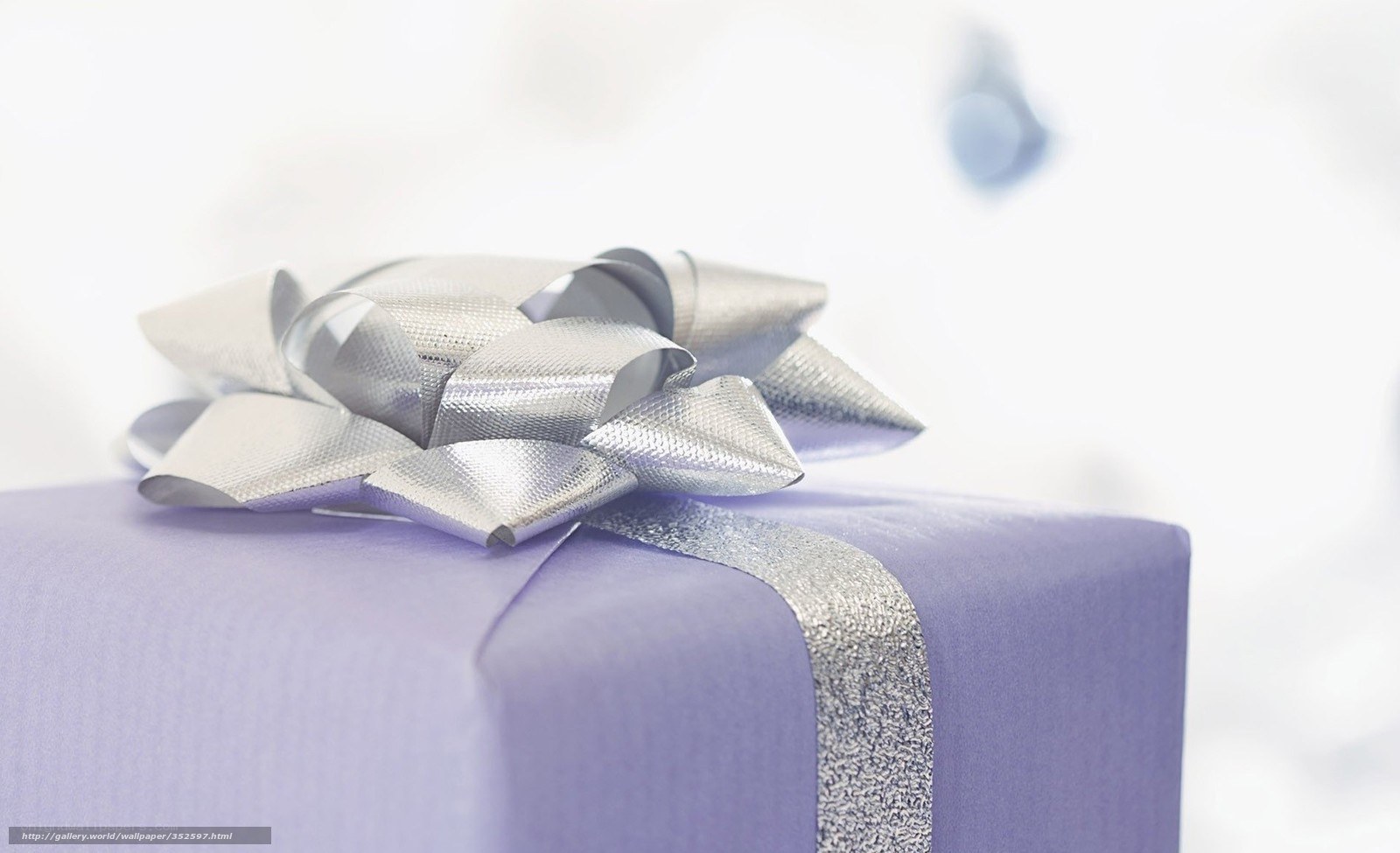 purple gift with silver bow