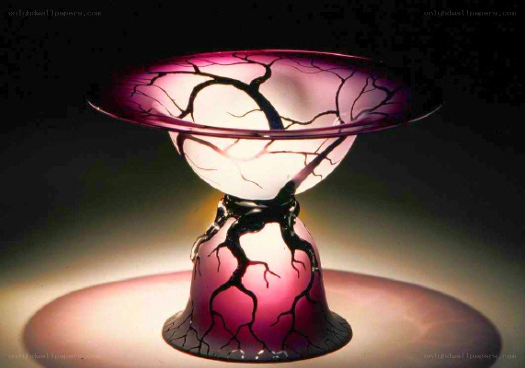 Purple glass sculpture with crackle pattern