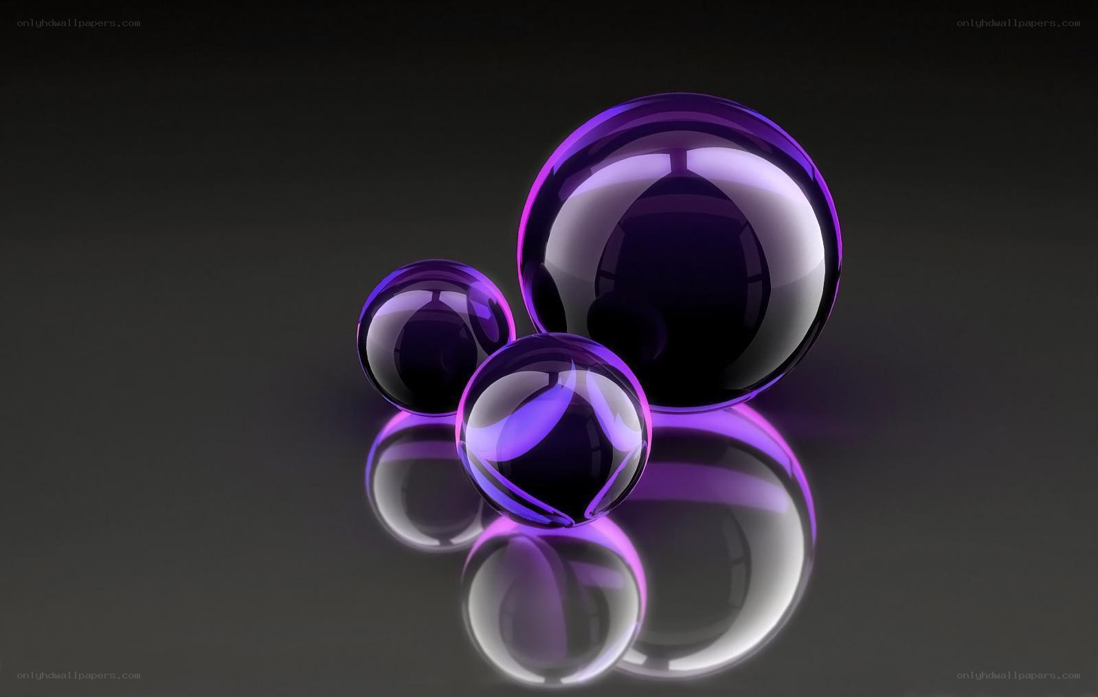 Purple glass spheres on dark surface