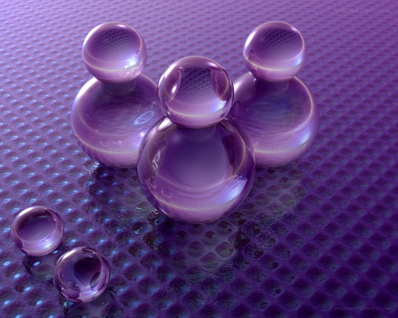 Purple glass spheres on textured surface