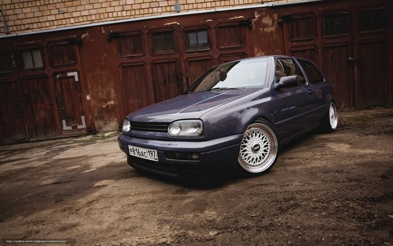 purple golf parked outside
