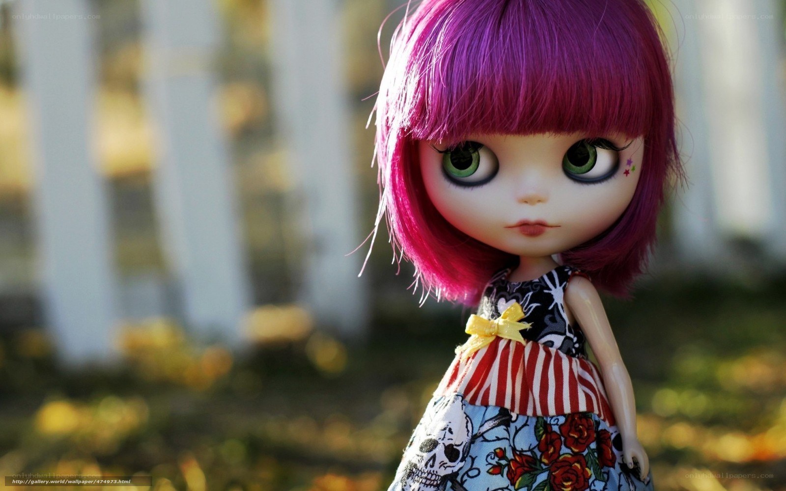 purple-haired doll in garden