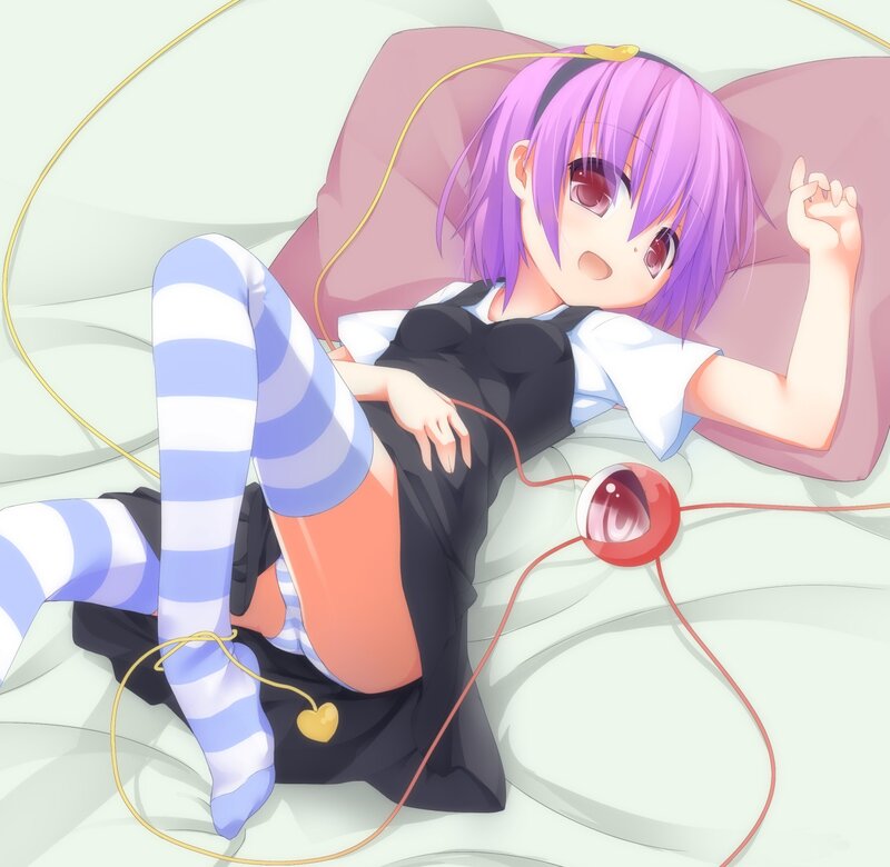 purple-haired girl lying on bed