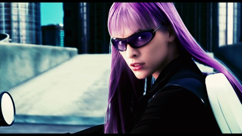purple-haired woman in sunglasses