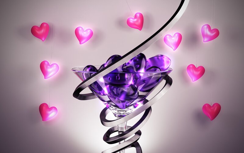 Purple hearts in a glass bowl