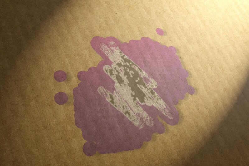 purple ink stain on brown paper