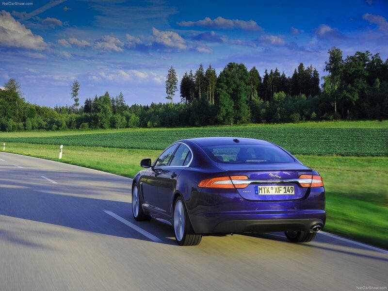 purple jaguar xfr on country road
