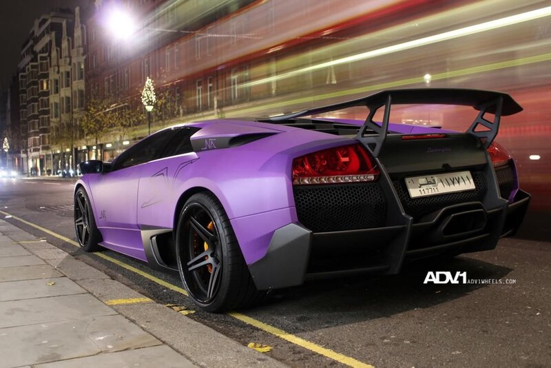 purple lamborghini on city street
