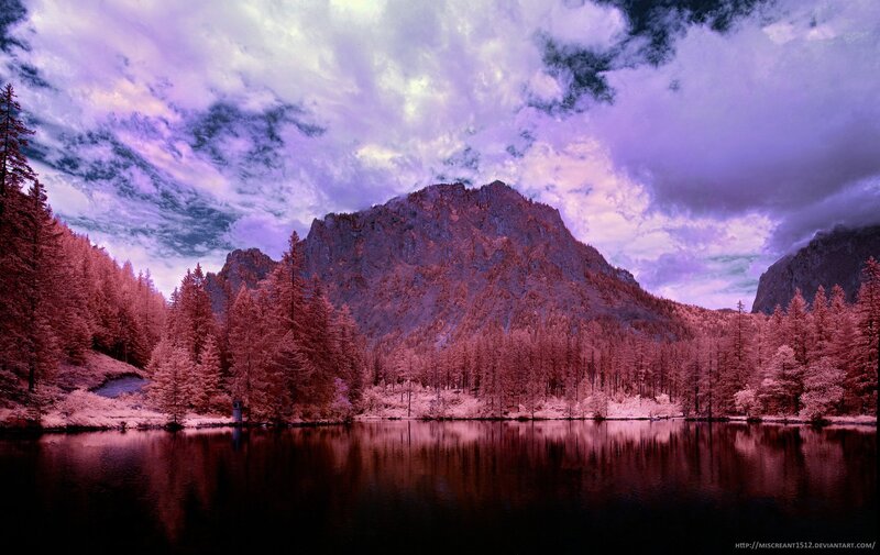 Purple landscape with lake and mountains