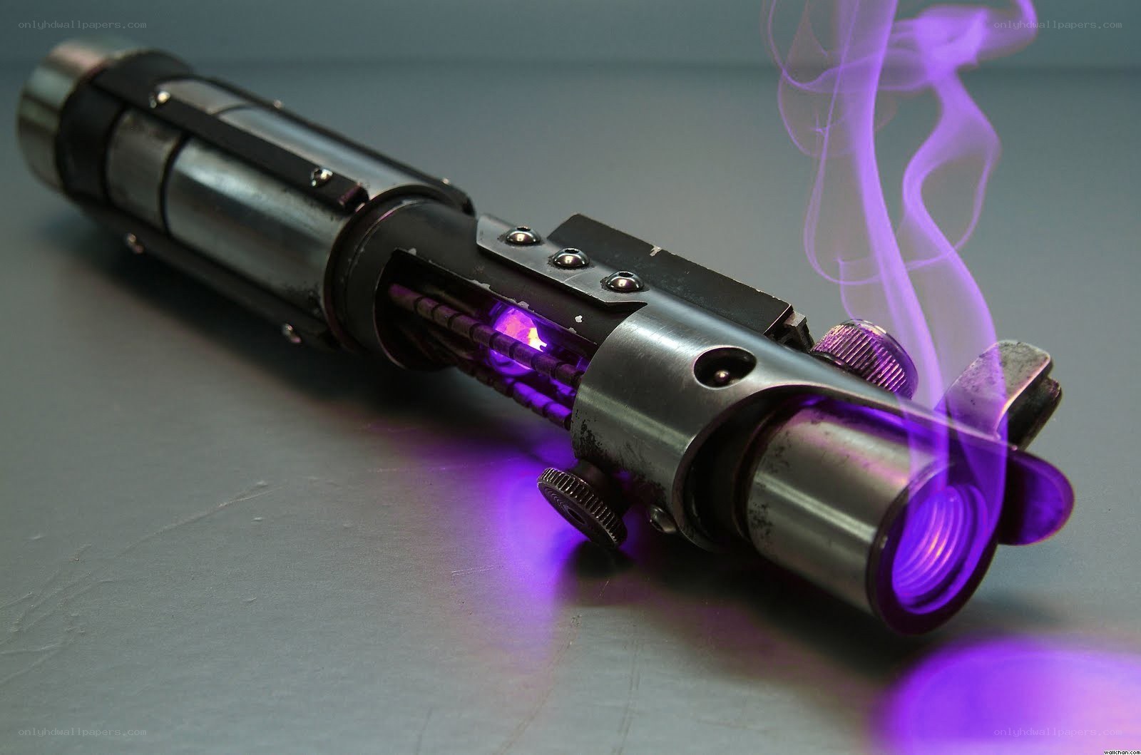 purple lightsaber with smoke