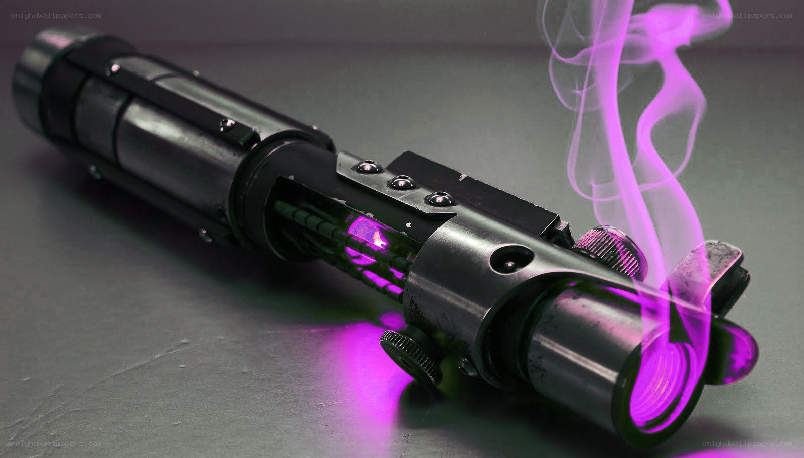 purple lightsaber with smoke