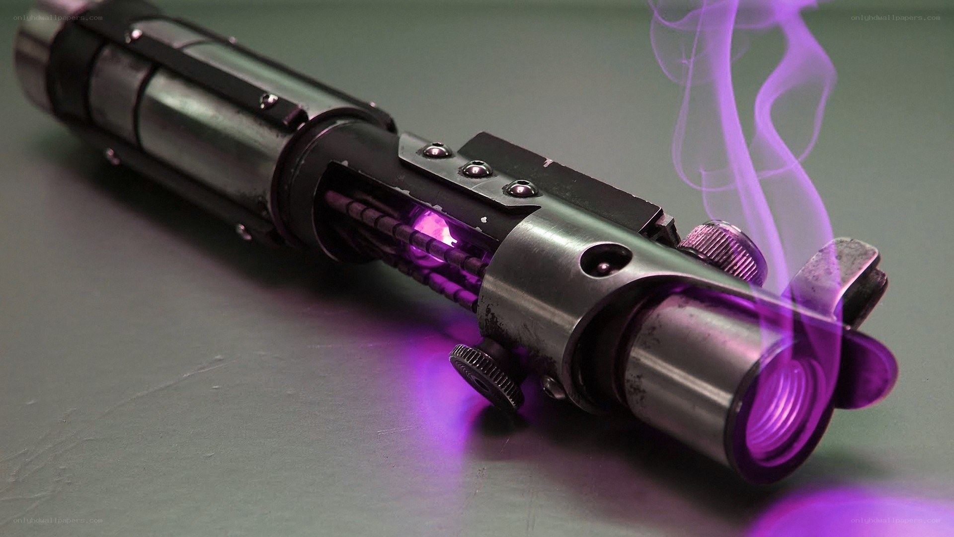 purple lightsaber with smoke