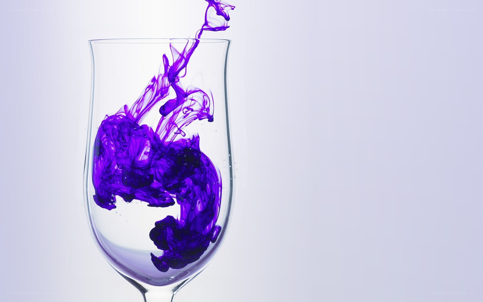 purple liquid in glass