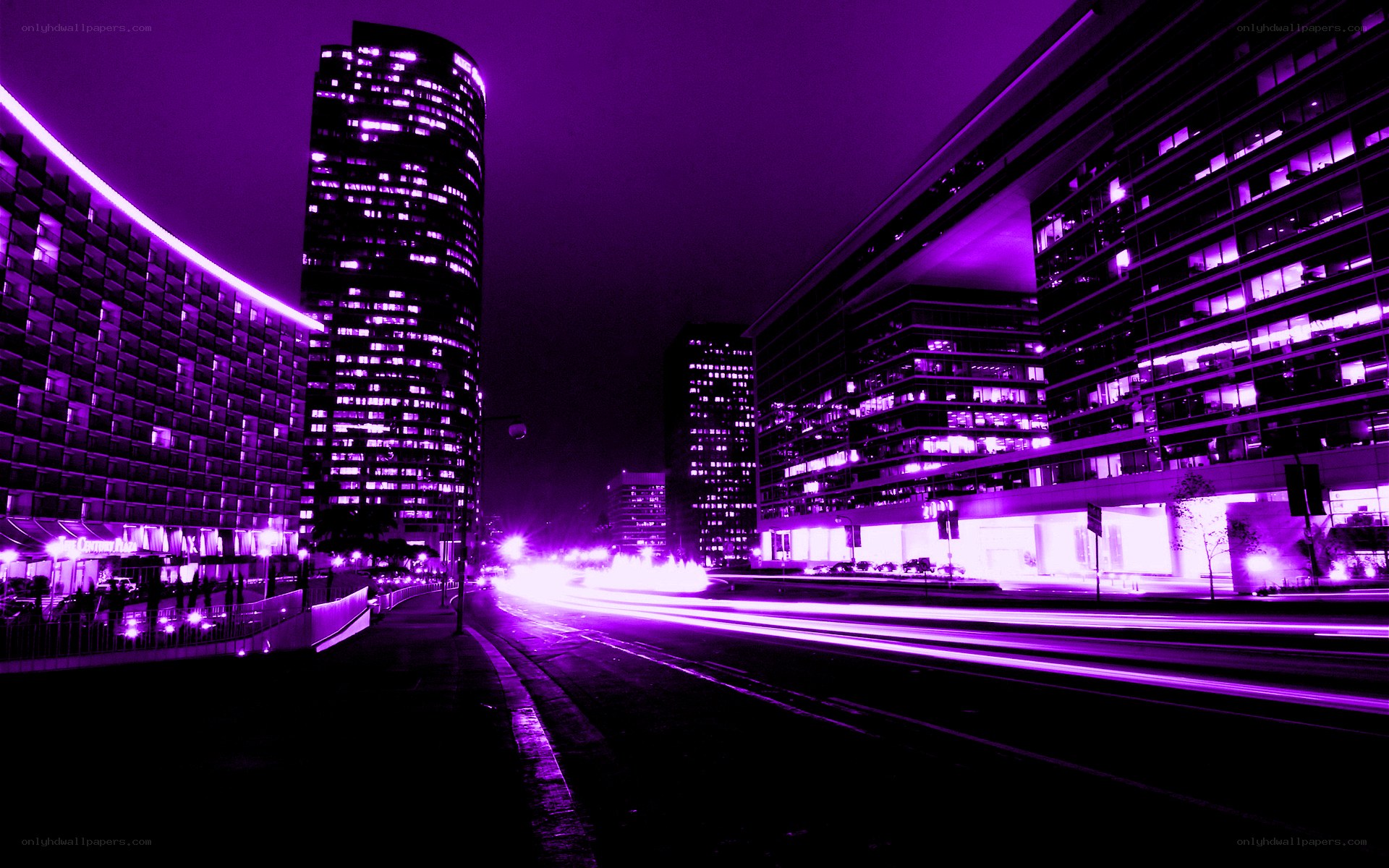 Purple-lit city at night