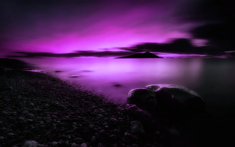 Purple-lit Pebble Beach