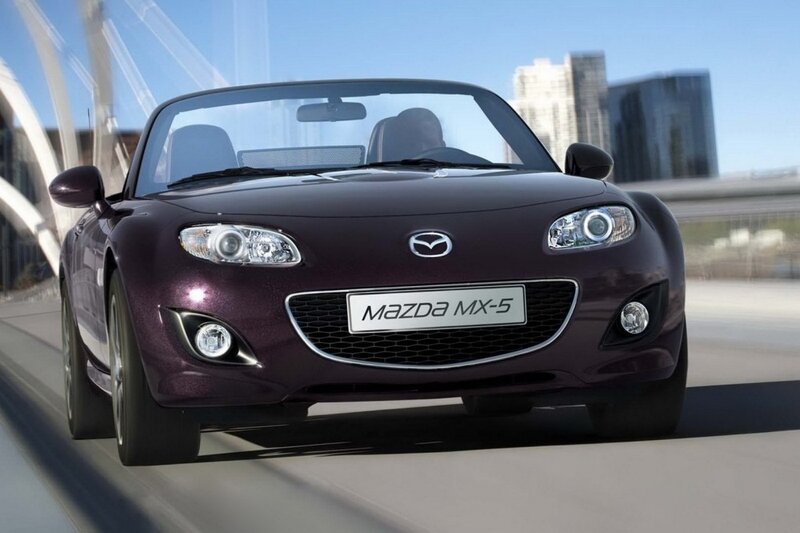 Purple Mazda MX-5 driving