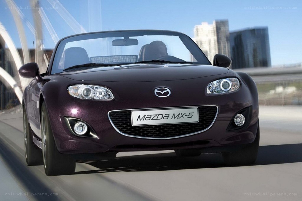 Purple Mazda MX-5 driving