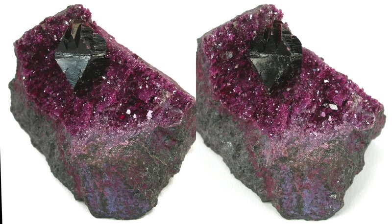 Purple mineral specimen with black crystals