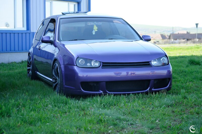purple modified hatchback car