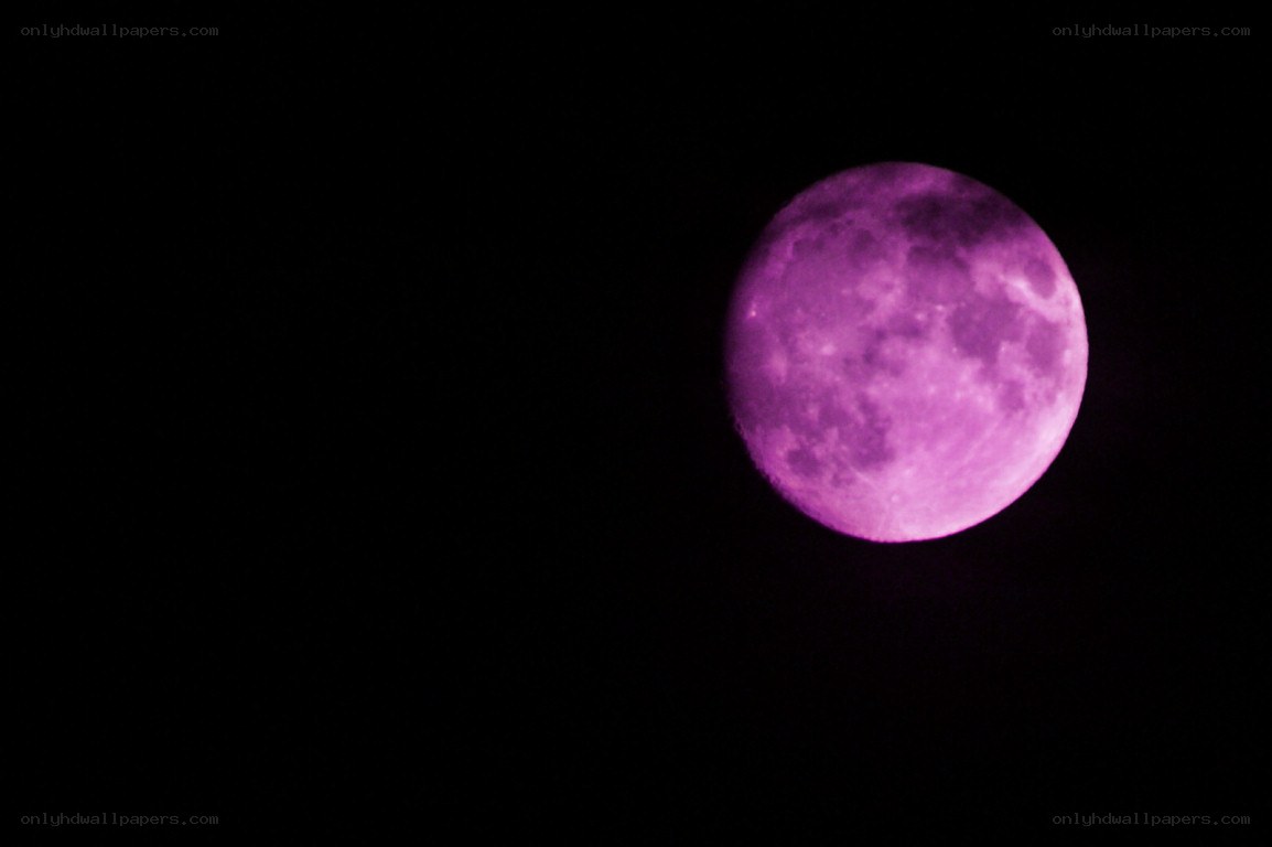 Purple moon in night sky