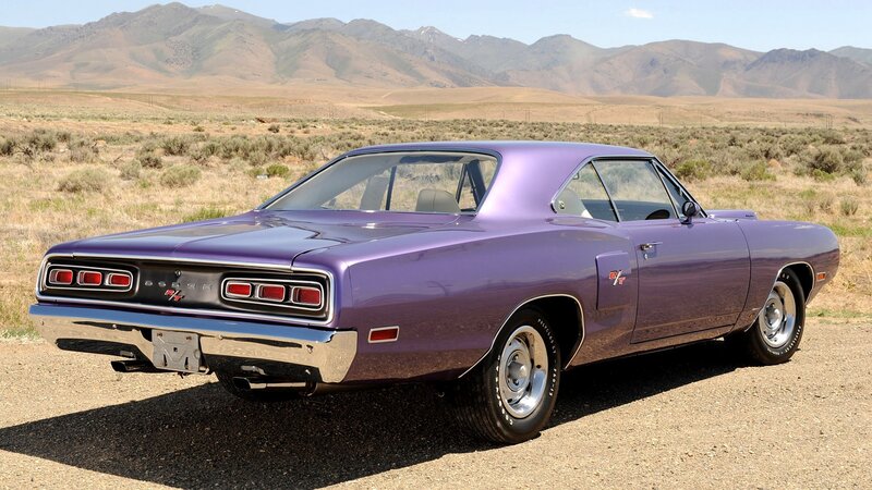 Purple muscle car in desert