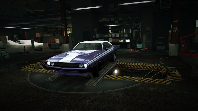purple muscle car in garage
