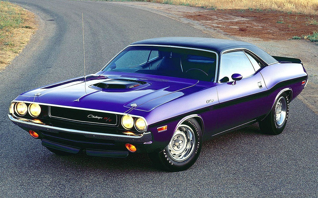 Purple muscle car on road