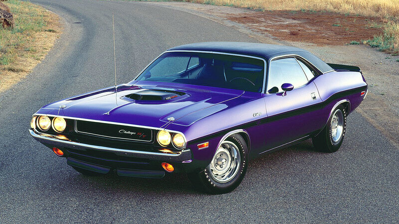 Purple muscle car on road