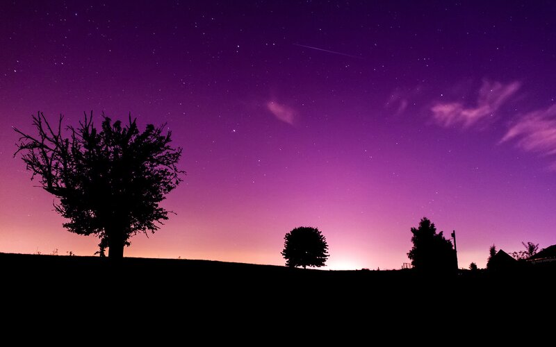 Purple night sky with stars