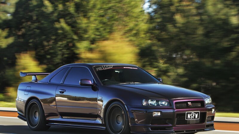 Purple Nissan GT-R in motion