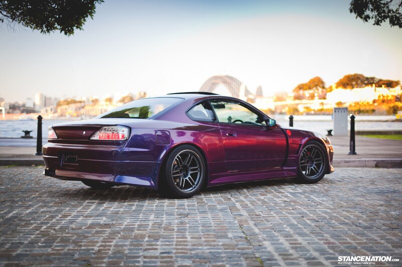 Purple Nissan Silvia on cobblestones