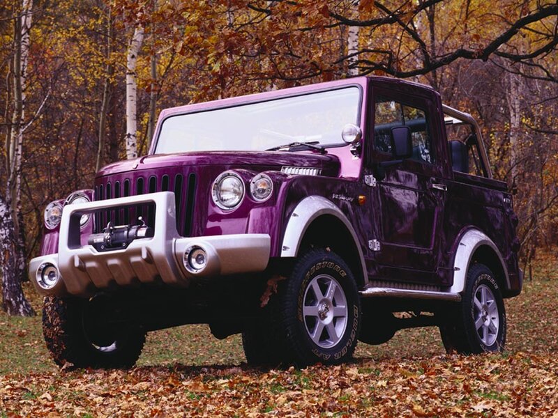 purple off-road vehicle in autumn
