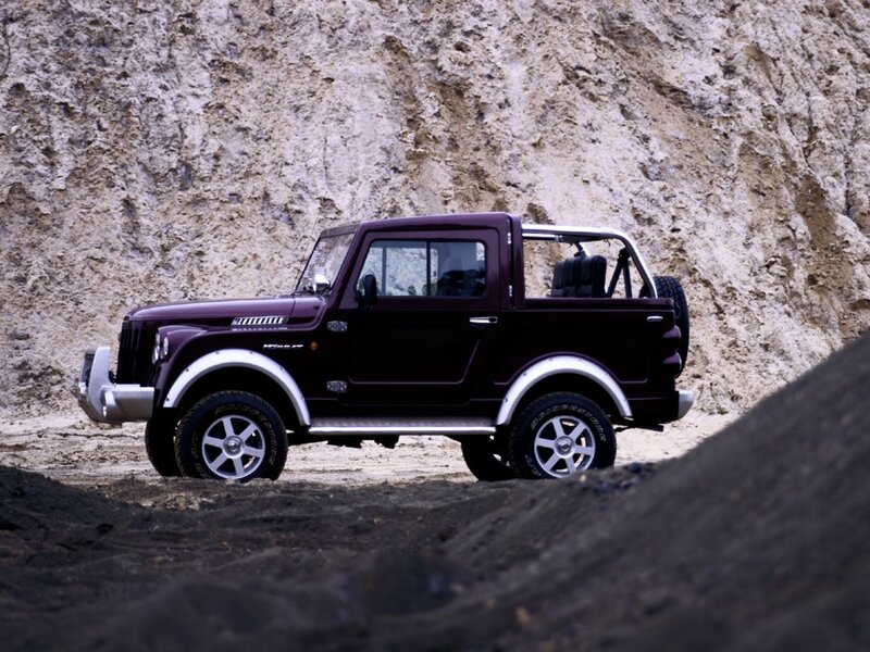 purple off-road vehicle in desert