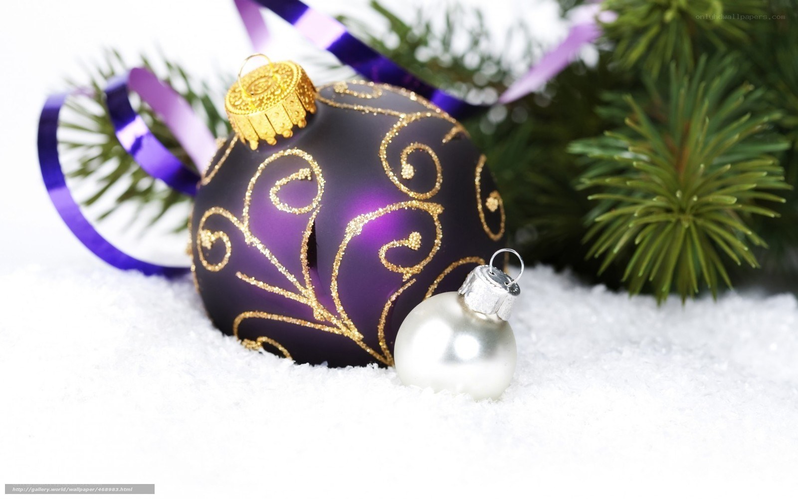 Purple ornament on snow