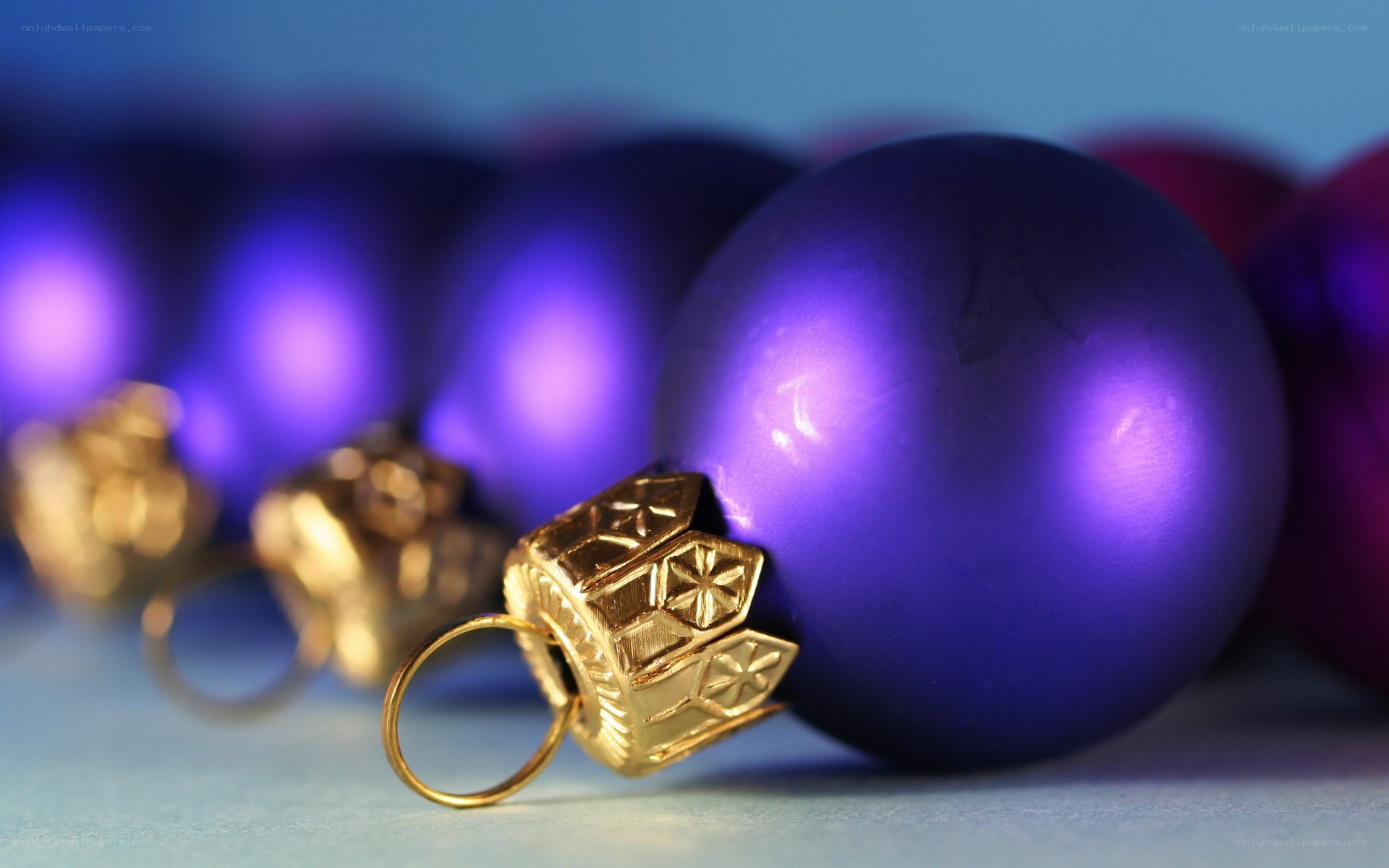 Purple ornaments in a row