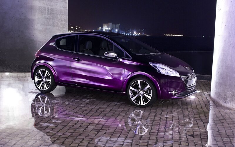 Purple Peugeot car at night